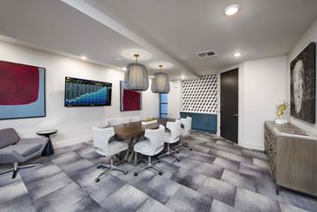 Business center with workstations and private conference room